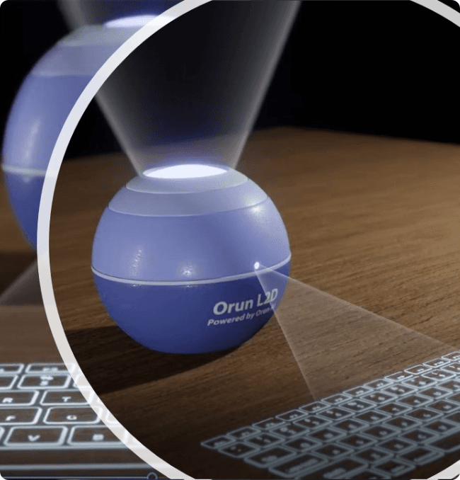 Orun learning device projecting a virtual keyboard onto a desk